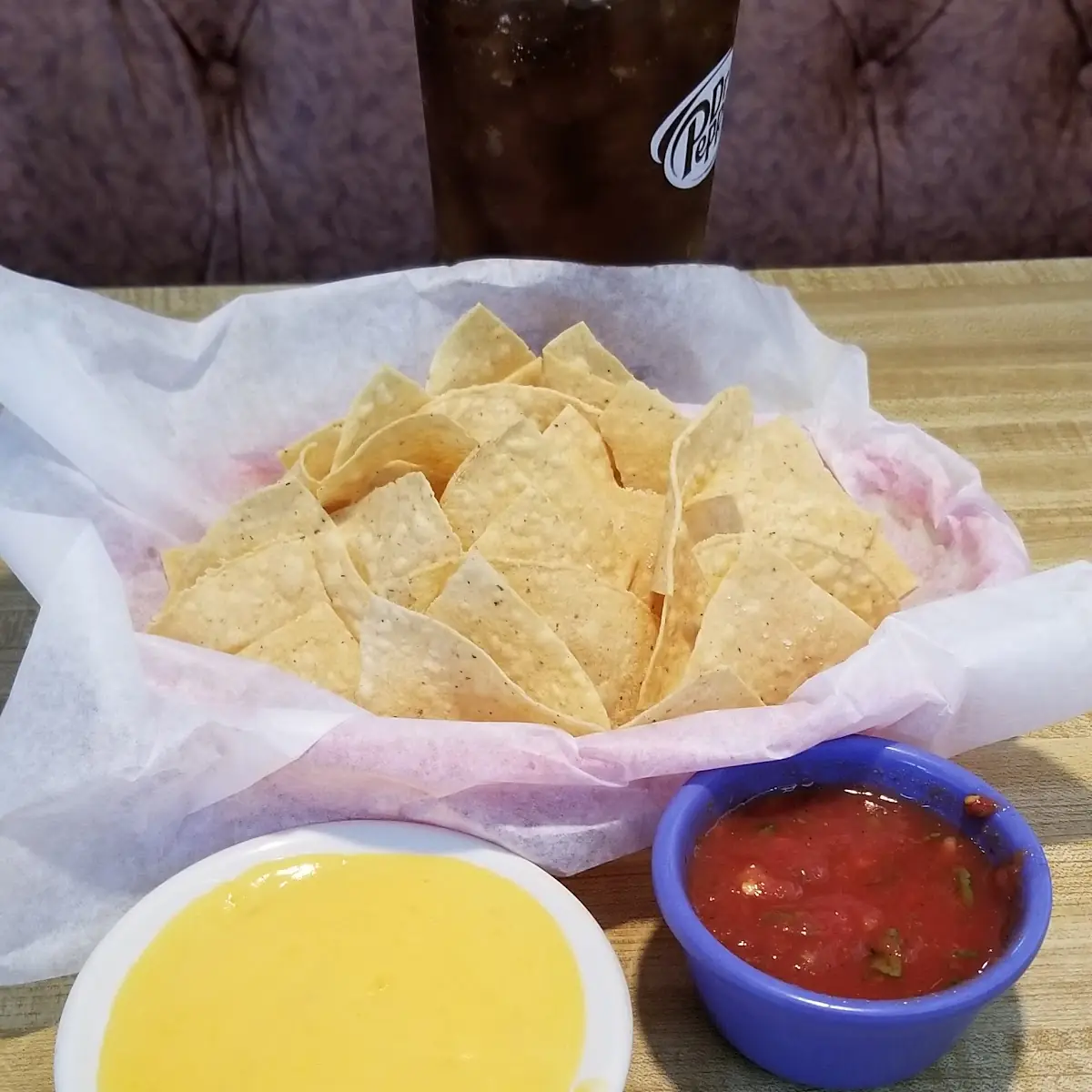 Chips Salsa Queso and a Coke