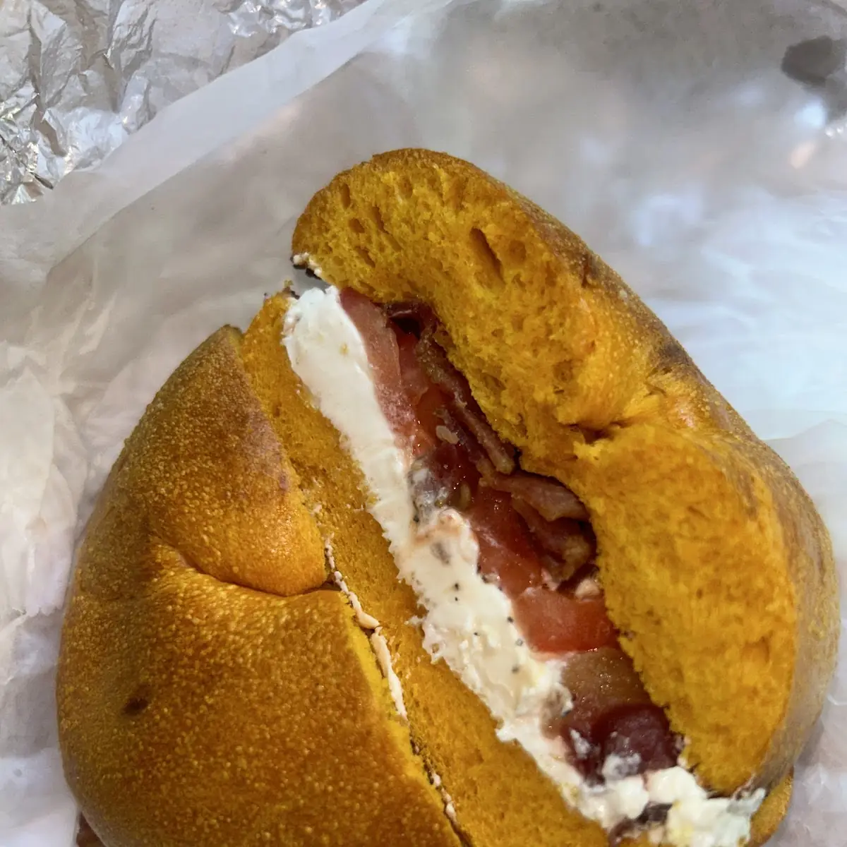Toasted Egg Bagel with Bacon Cream Cheese and Tomato
