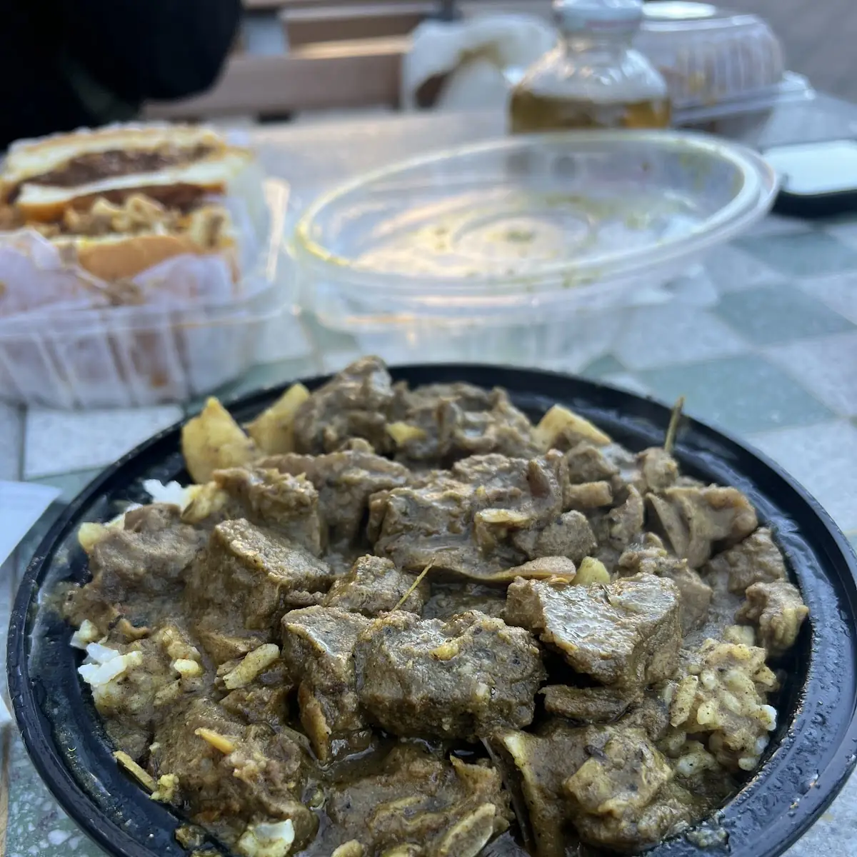 Curry Goat over White Rice