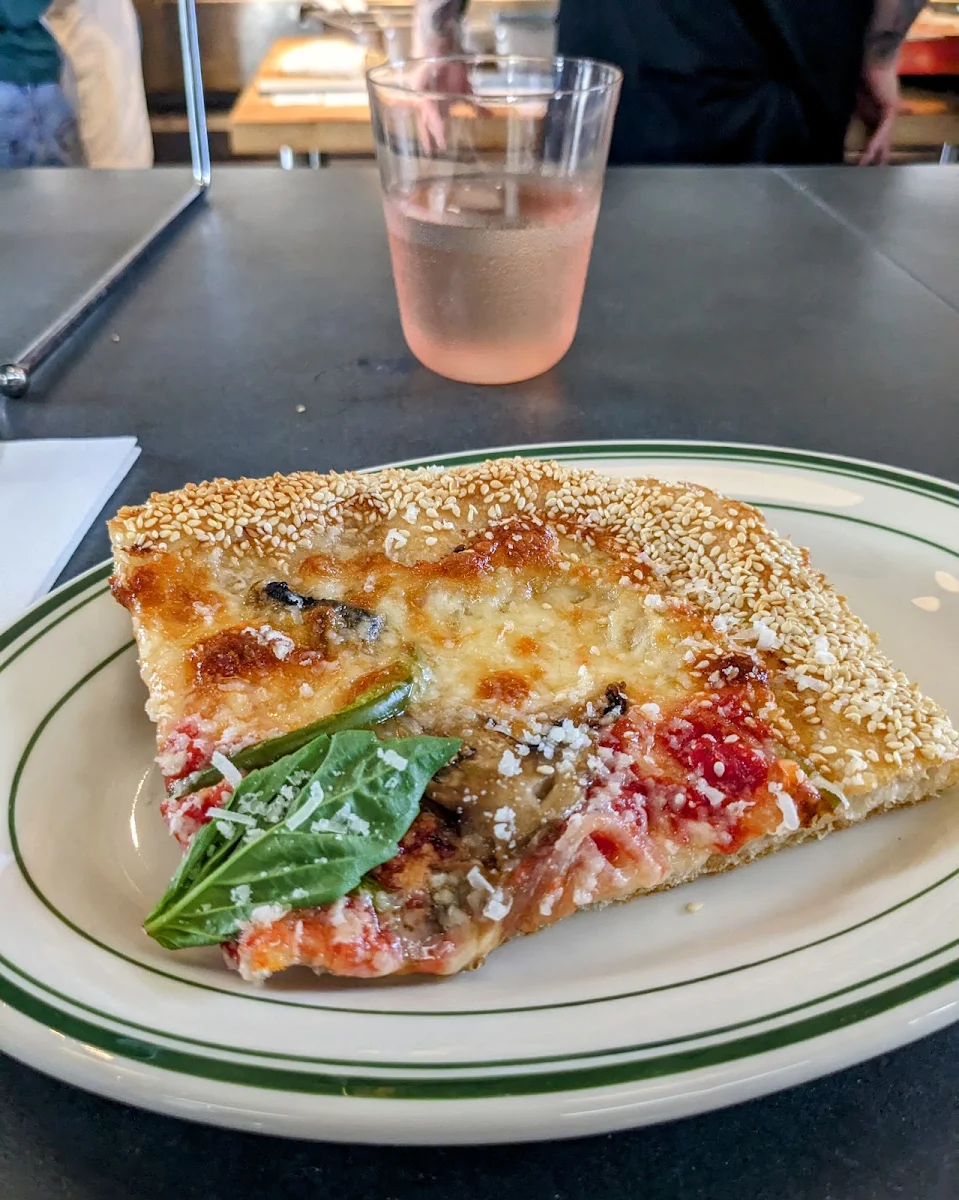 New York Style Pizza Slice with Basil