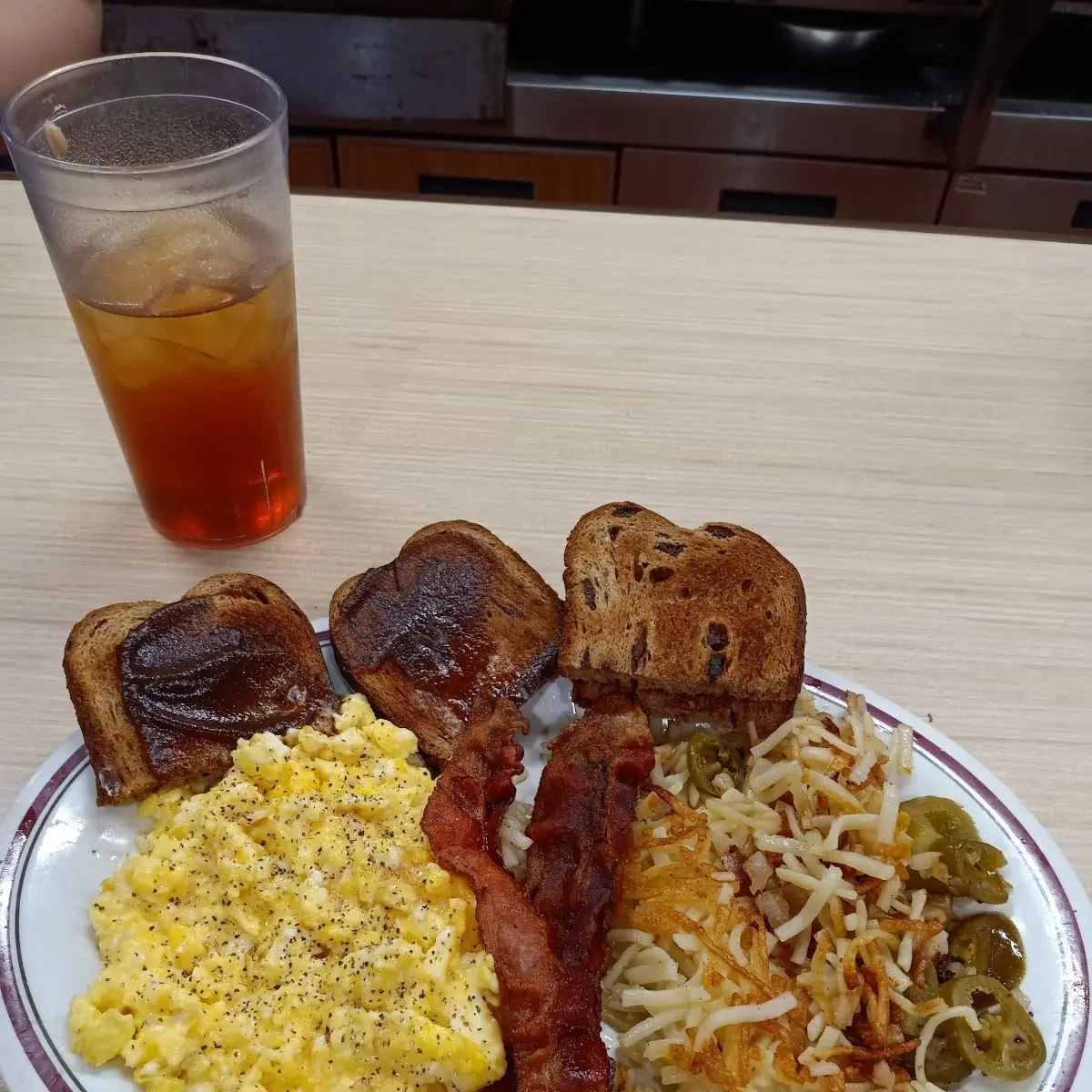 Scrambled Eggs and Cheese with Bacon and Raisin Toast