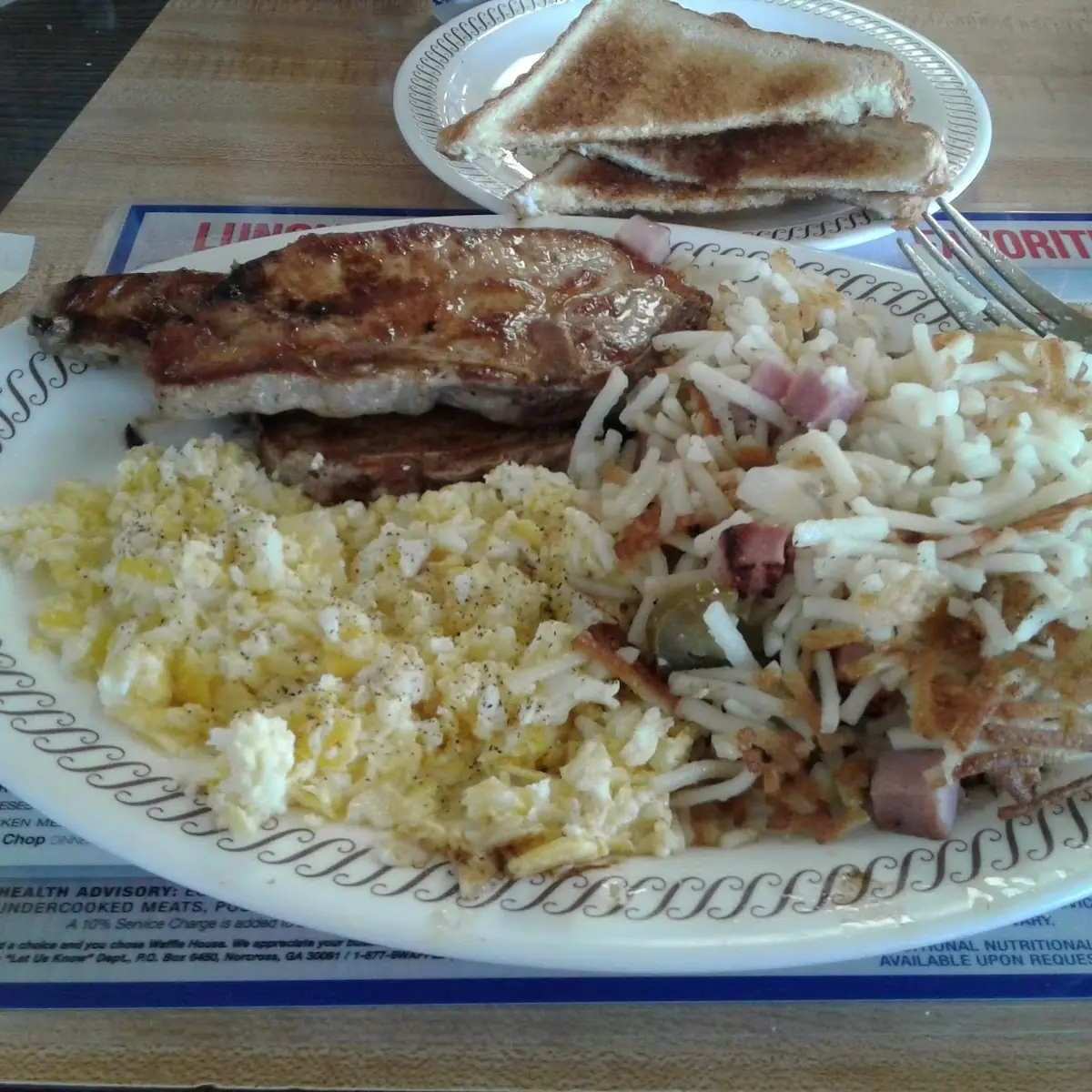 Pork Chop Breakfast with Eggs and Hash Browns