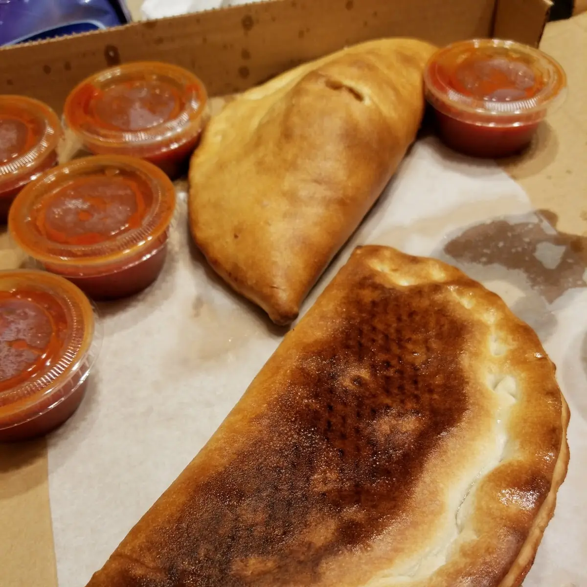 Baked Calzone and Dipping Sauce
