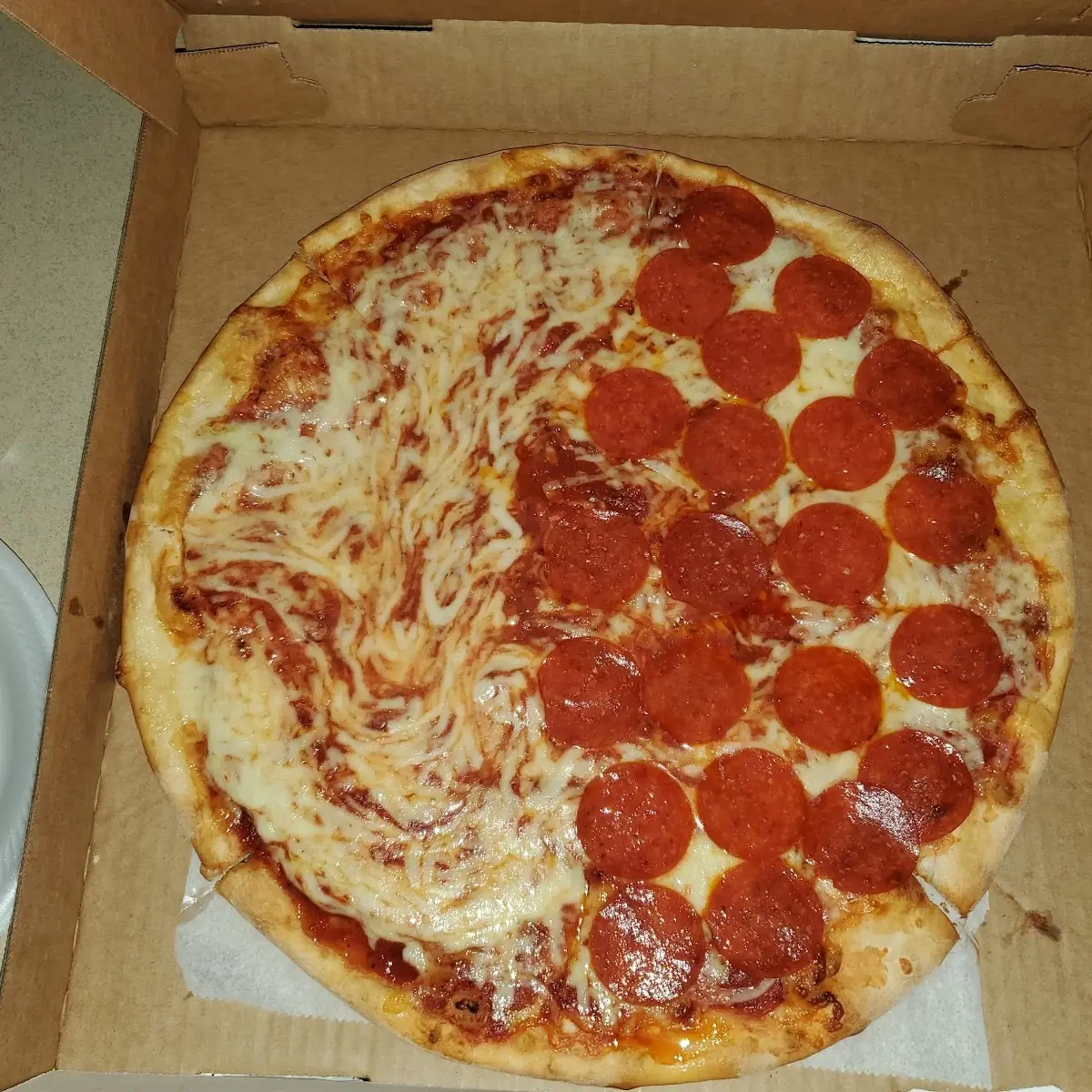 Half Plain Half Pepperoni Pizza