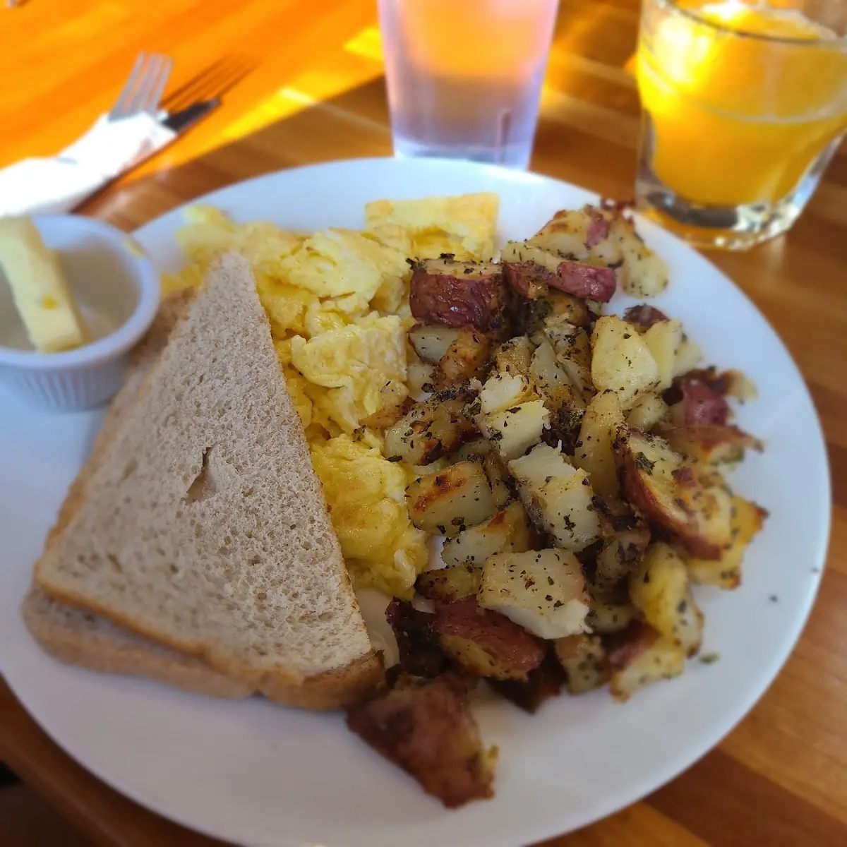 2 Eggs Scrambled Seasoned Potatoes Toast