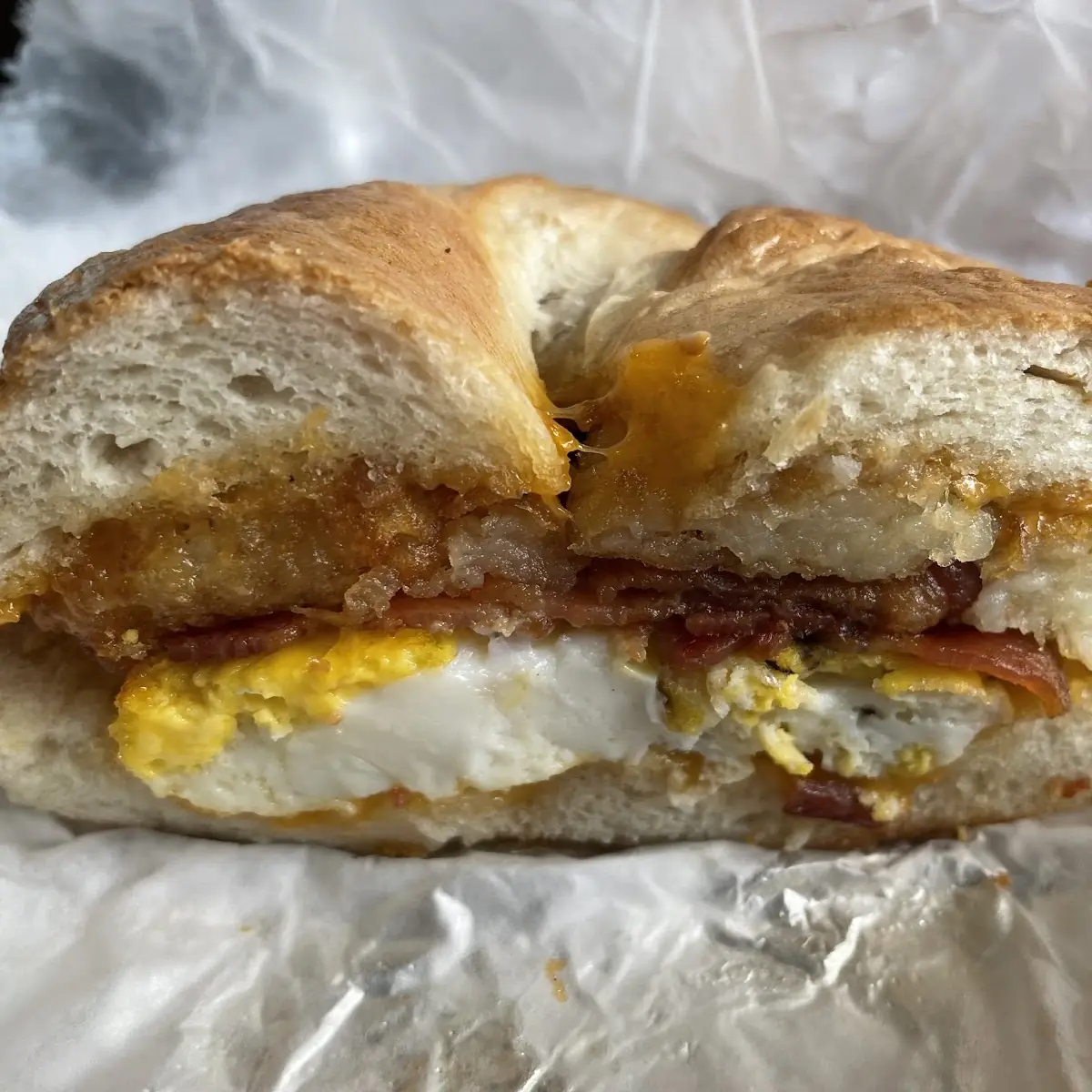 Bagel with Eggs Bacon and Hash Browns