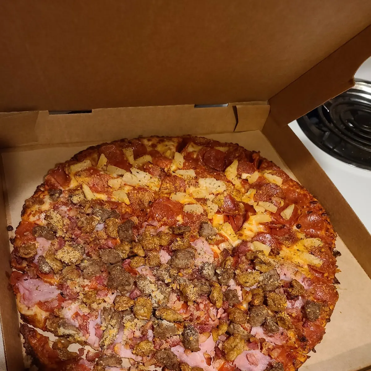 Half Meat Lovers and Half Pepperoni with Pineapple