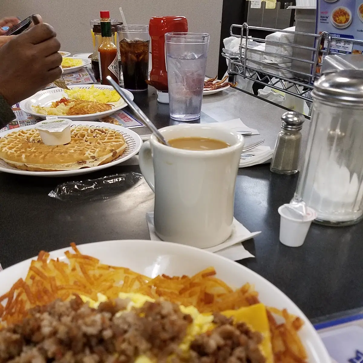 Sausage Egg and Cheese over Hash Browns