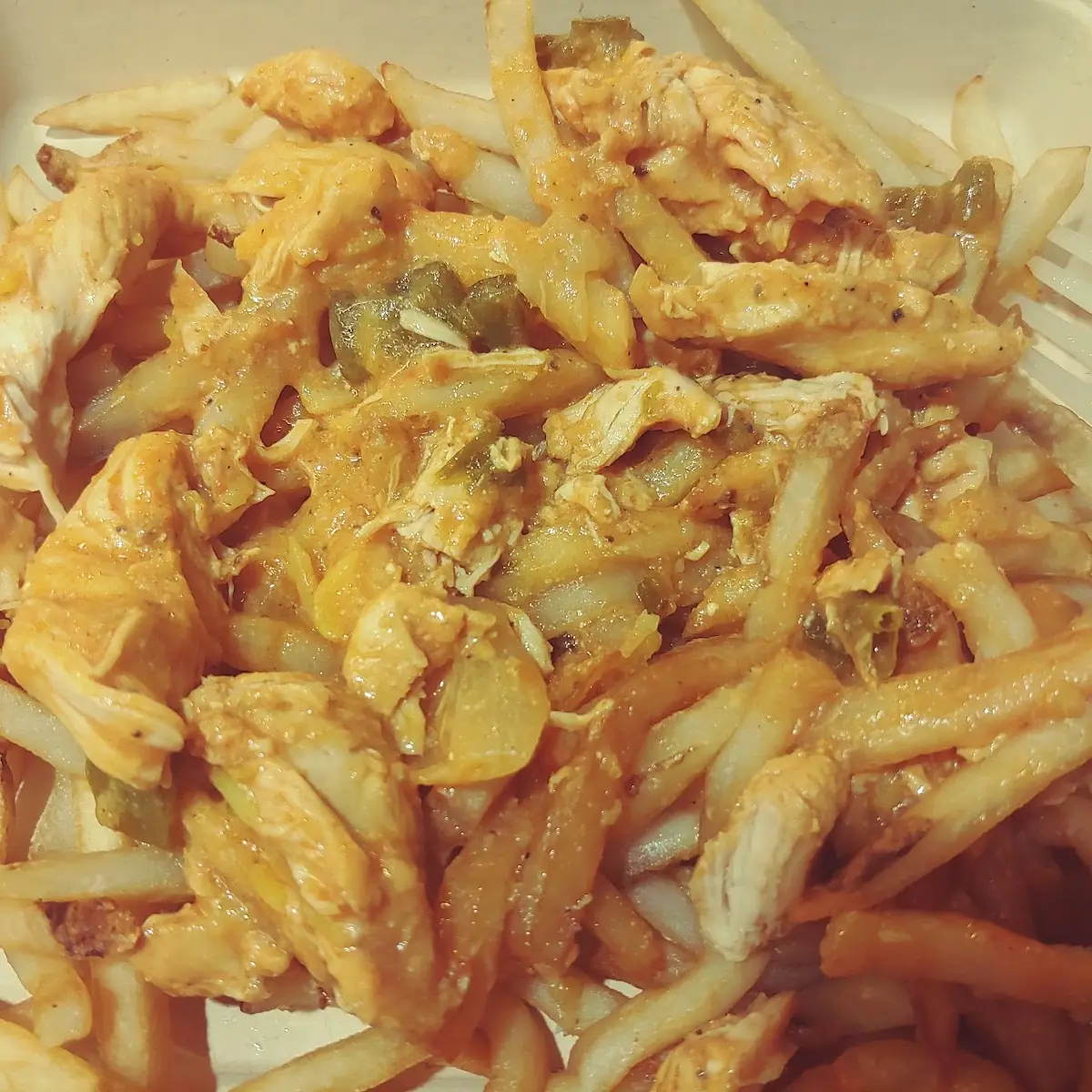 Butter Chicken over Fries