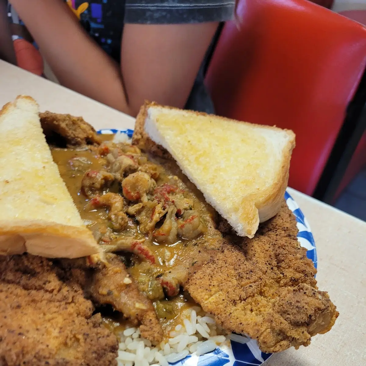 Fried Fish Topped with Crawfish Etouffee