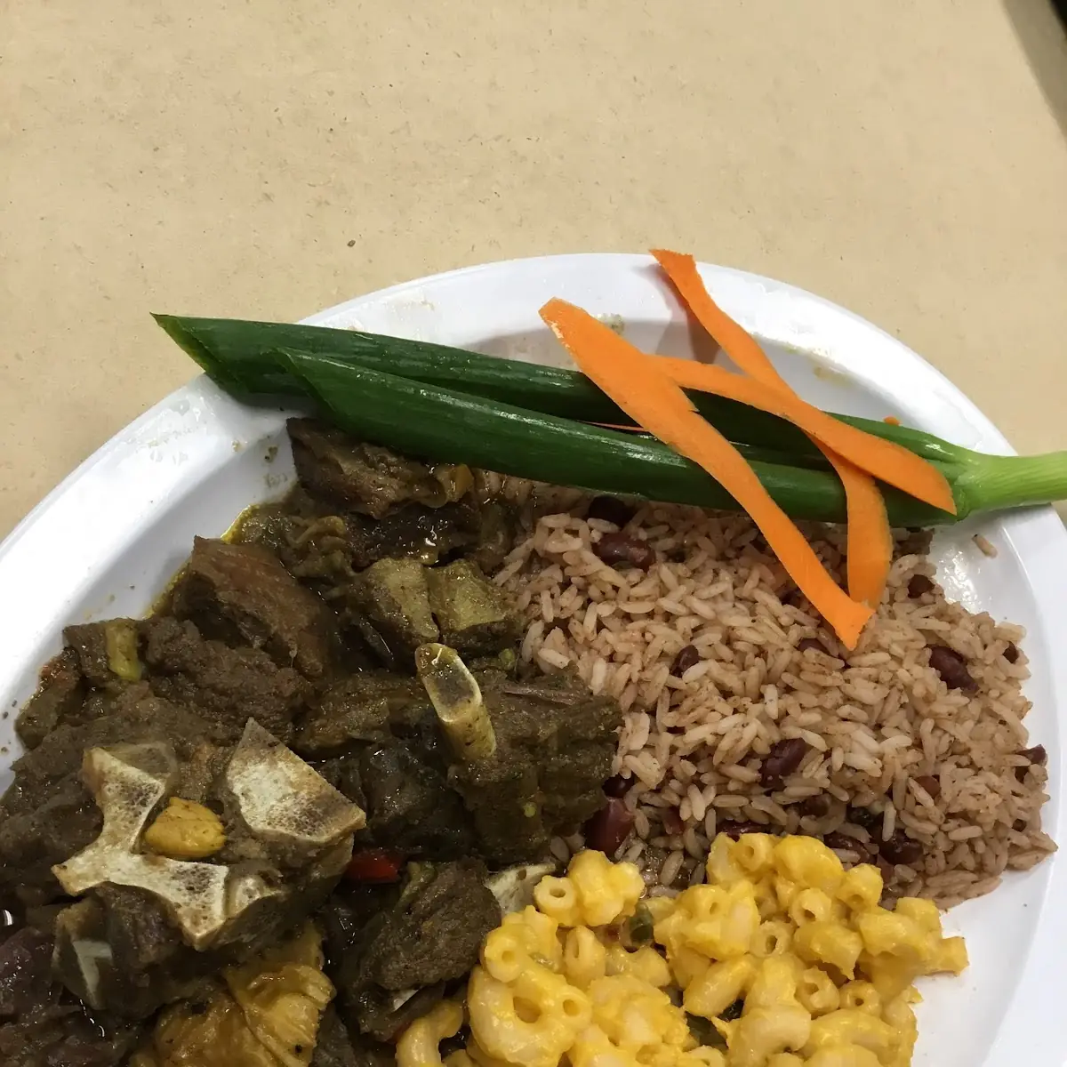 Oxtails Curry Goat or Fish Fillet Din