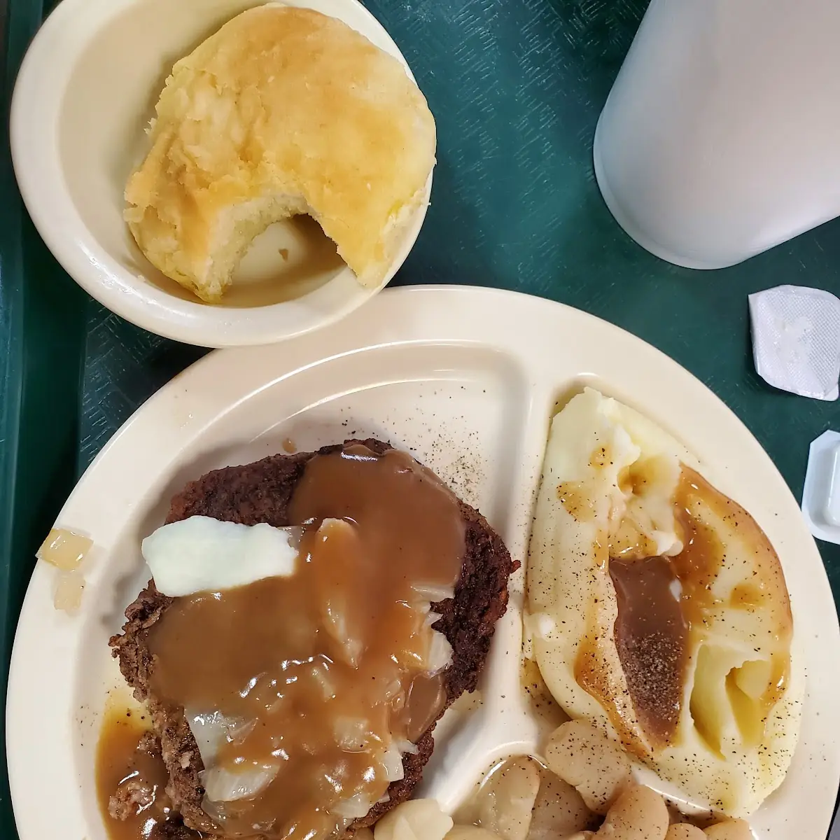 Hamburger Steak with Gravy and Onions Creamed Potatoes Lima Beans