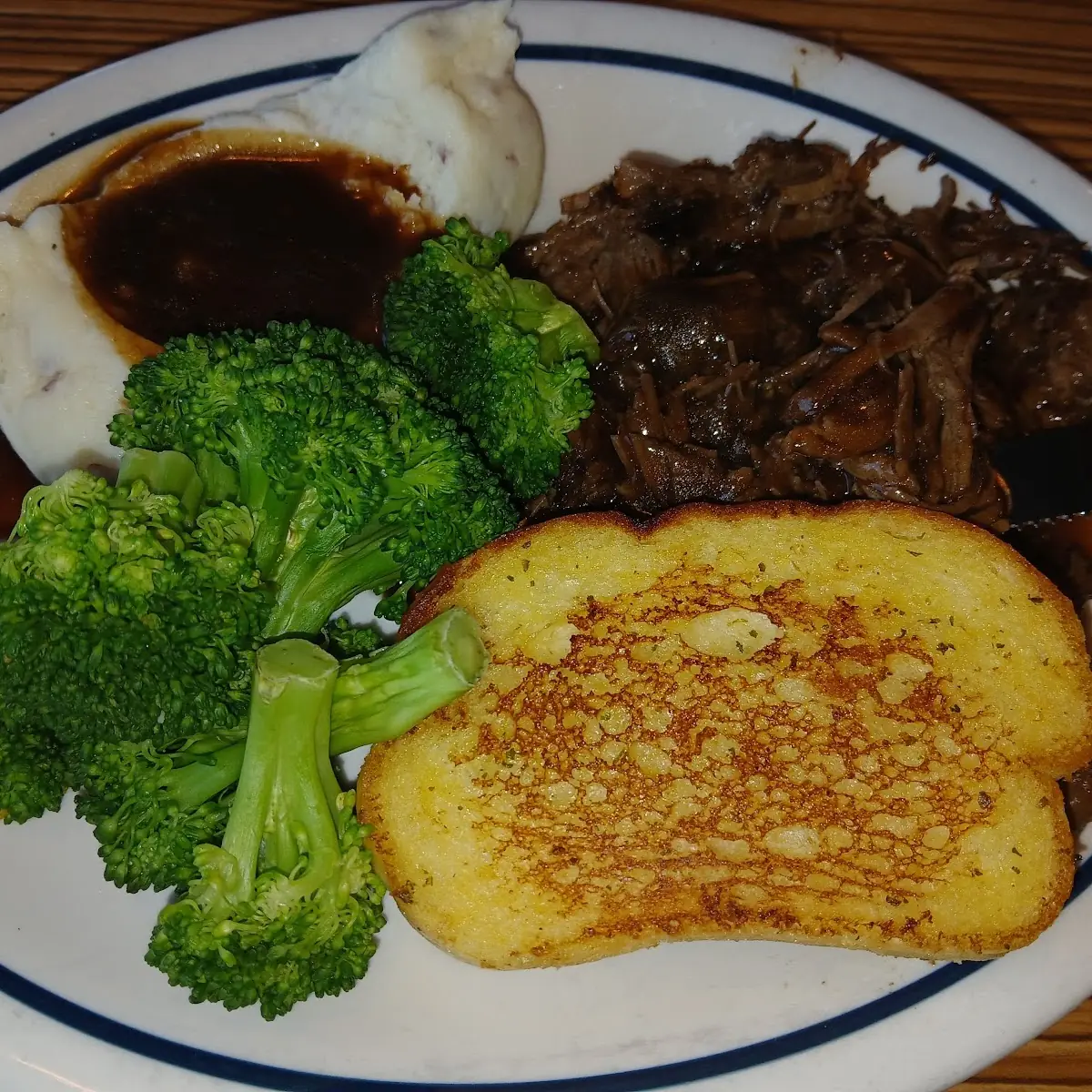 Pot Roast with Mashed Potatoes and Broccoli and Garlic Bread