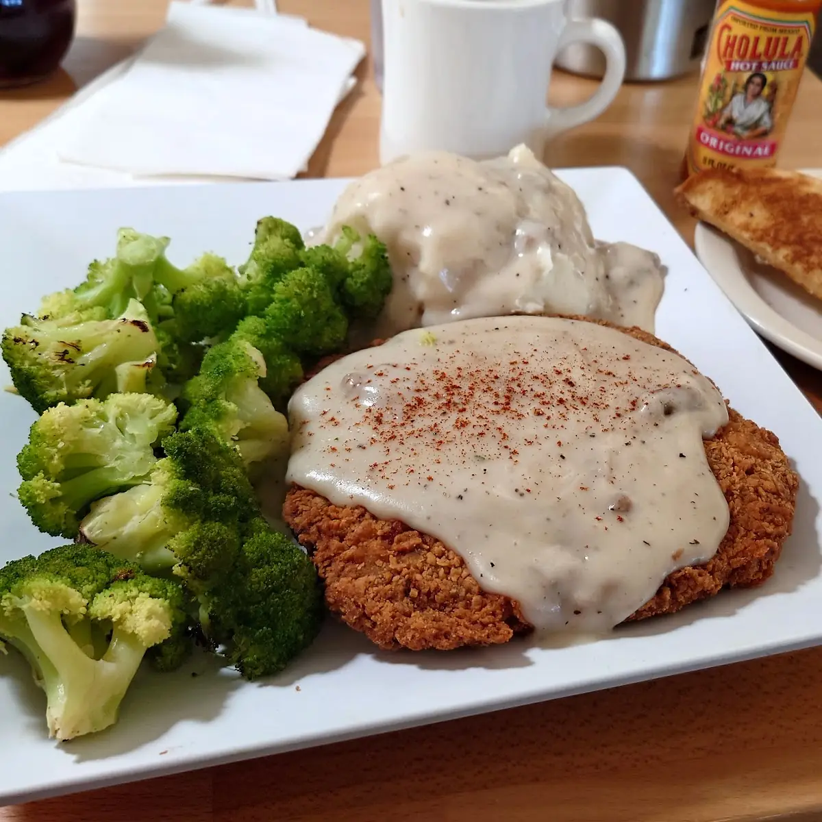 Country Fried Steak with Mashed Potatoes Broccoli and Texas Toast