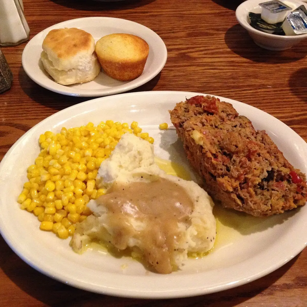Meatloaf Mashed Potatoes with Brown Gravy Corn Green Bean Casserole Cornbread and Biscuit