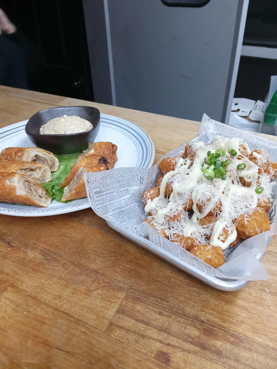 Steak and Cheese Egg Rolls and Dynamite Tots