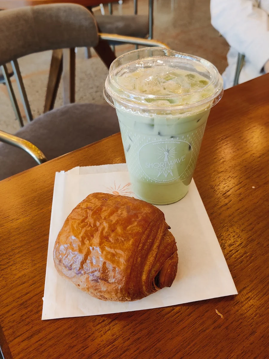 Chocolate Croissant and Iced Matcha Latte