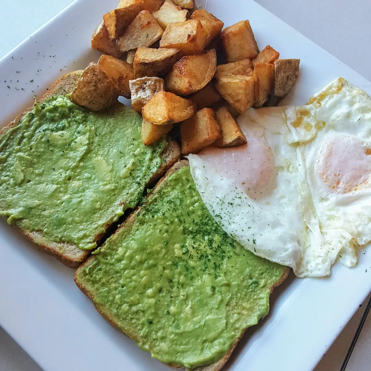 Avocado Toast with Eggs and Potatoes