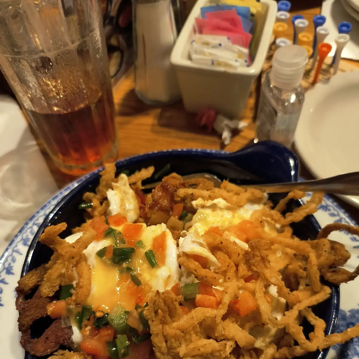 Hash Brown Casserole with Bacon and Eggs over Medium