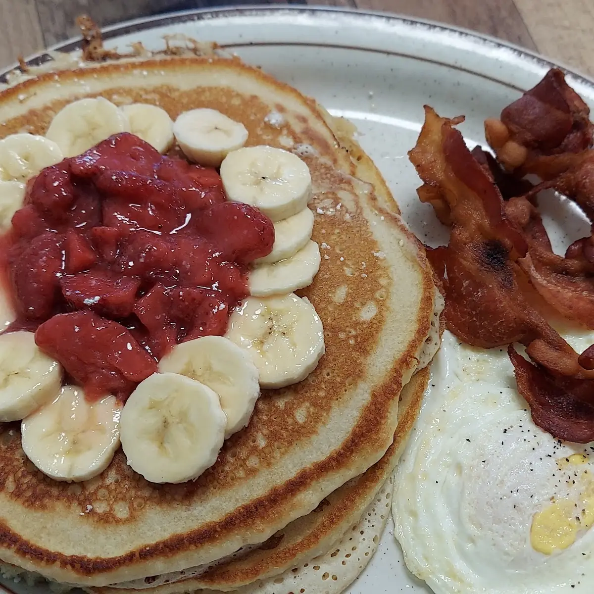 Strawberry Banana Pancakes 2 Eggs 2 Crispy Bacon
