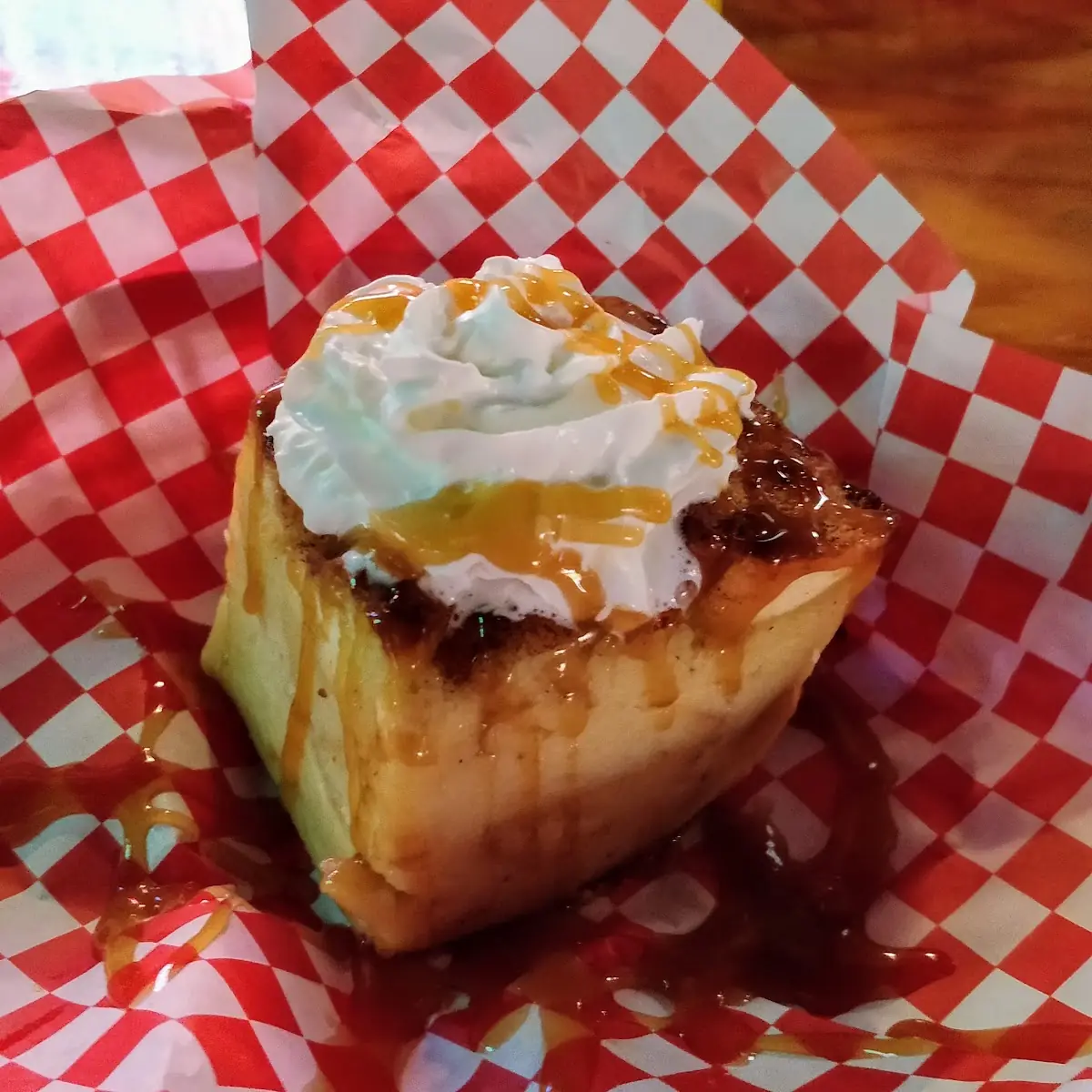 Bread Pudding with Whipped Cream and Caramel