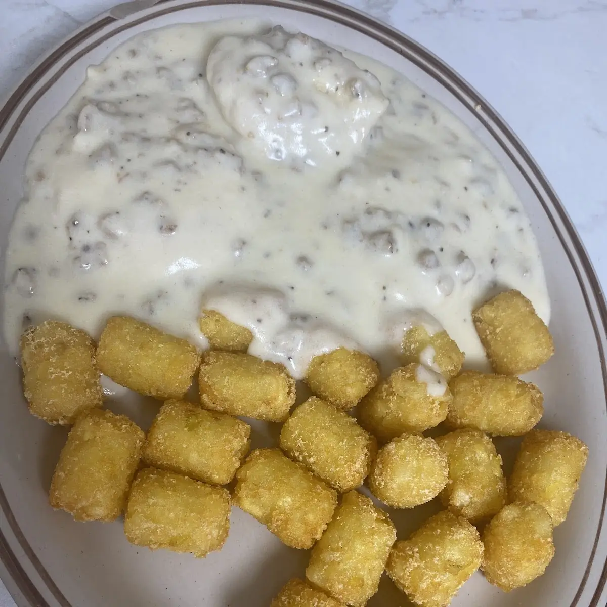 Sausage Gravy over Biscuits