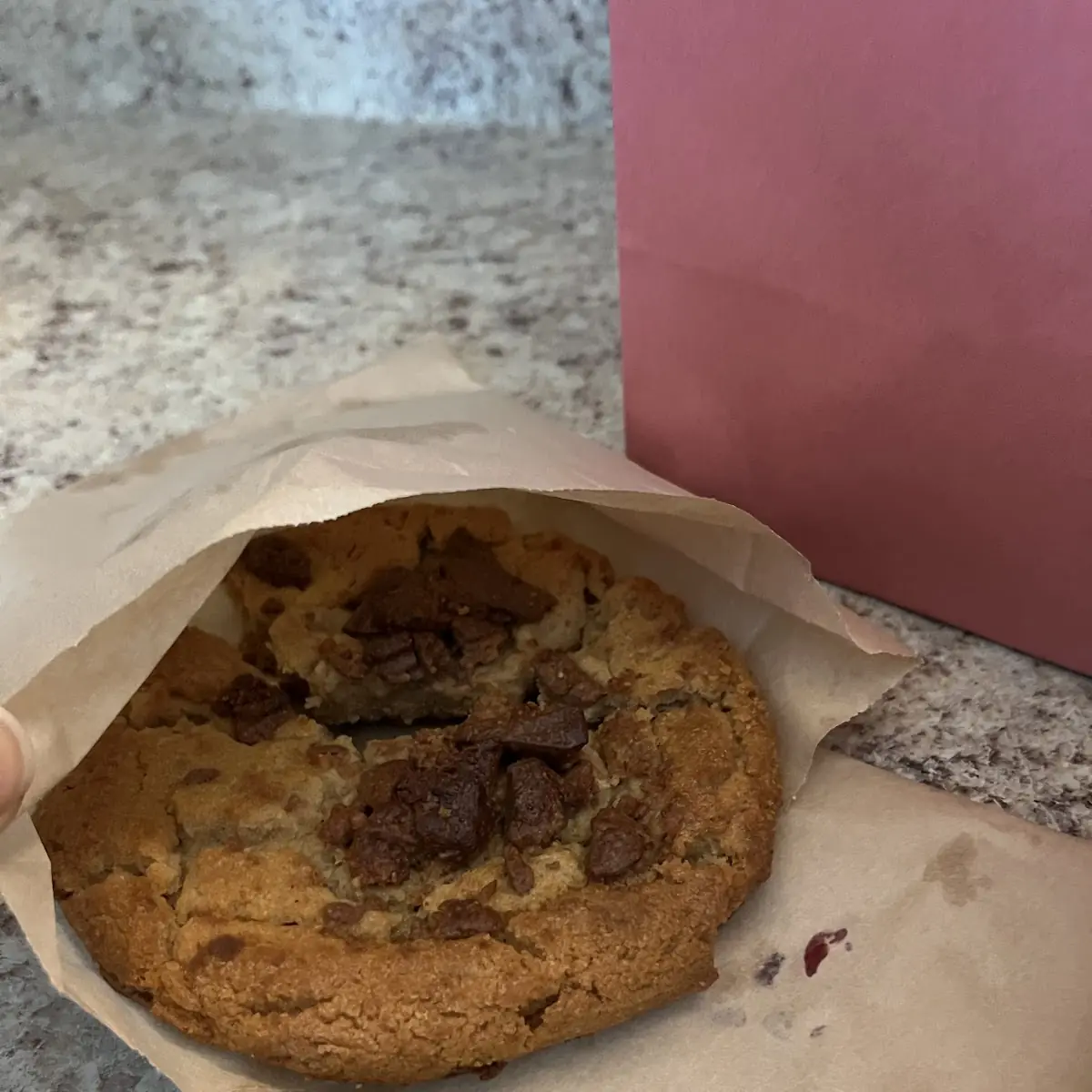 Warm Caramel Stuffed Chocolate Chip Cookie With Vanilla Bean Ice Cream