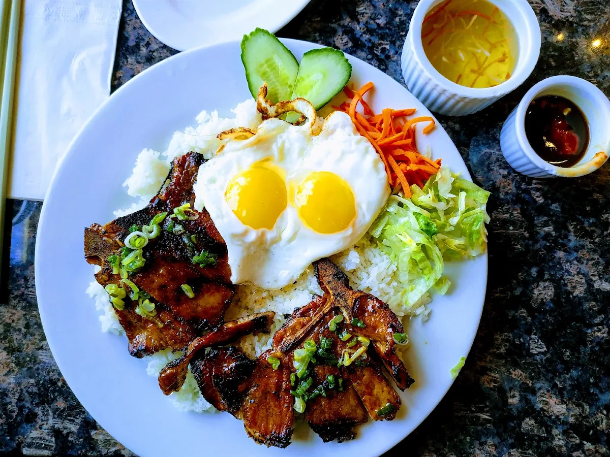 Double Pork Chops on a Bed of Rice Topped Off with 2 Eggs, Quynh Vietnamese Cuisine