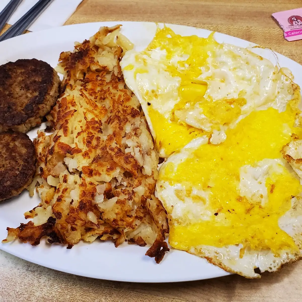Two Eggs over with Hash Browns and Sausage