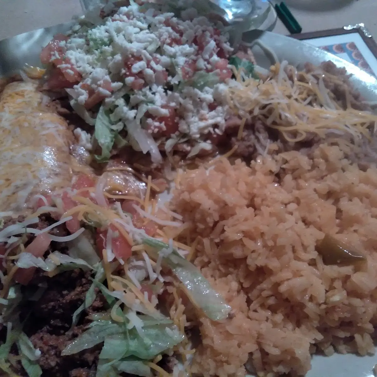 Three Choice Combo Grnd Beef Taco Cheese and Onion Enchilada and Chicken Tostata