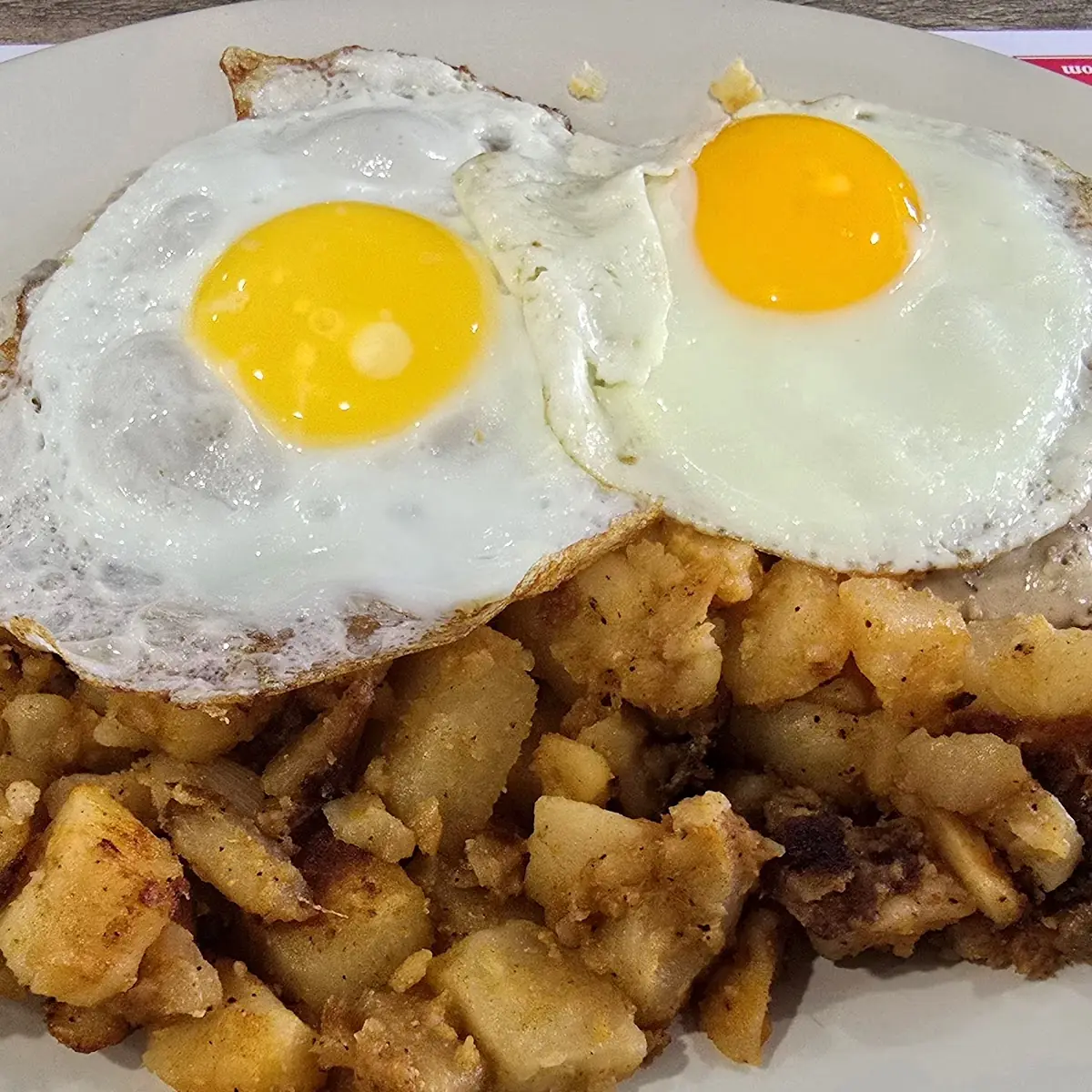Biscuits and Gravy with Two Eggs and Home Fried Potatoes