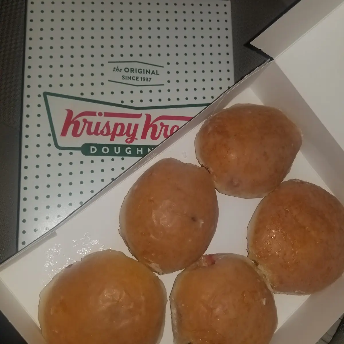 Glazed Raspberry Filled Dozens