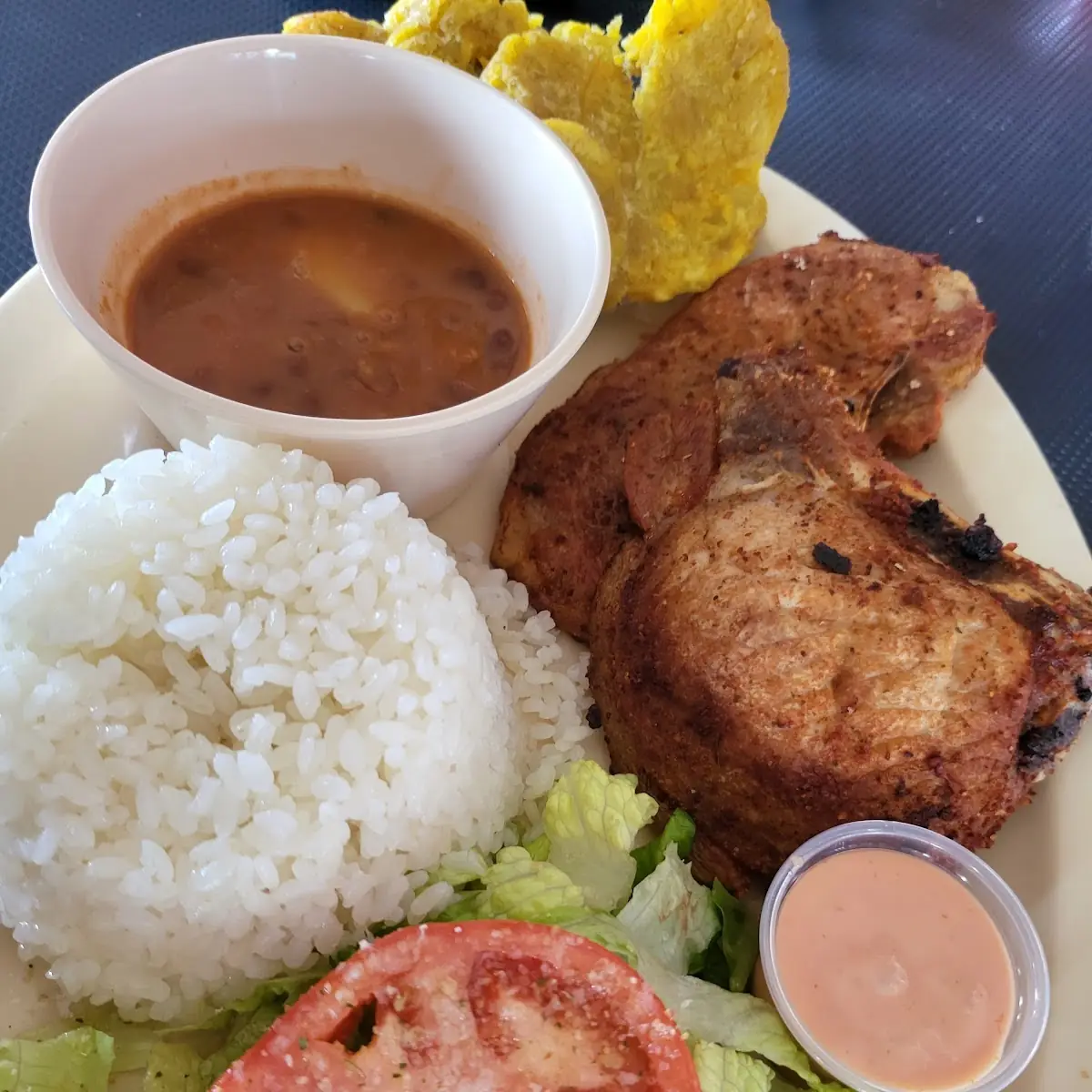 Arroz Con Chuleta Frita