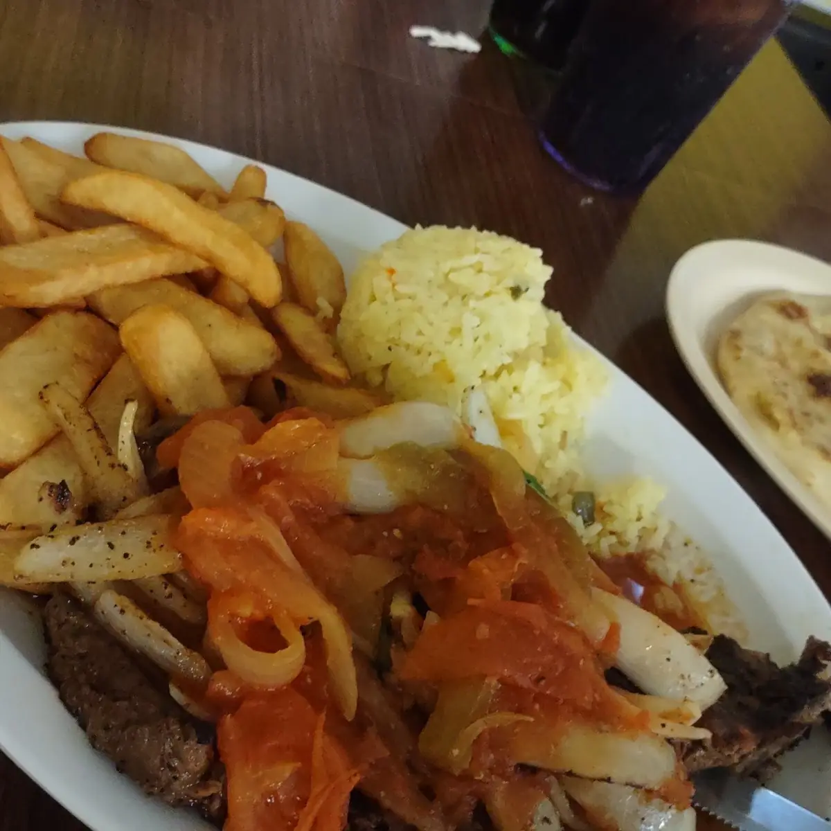 Medio Pollo Encebollado