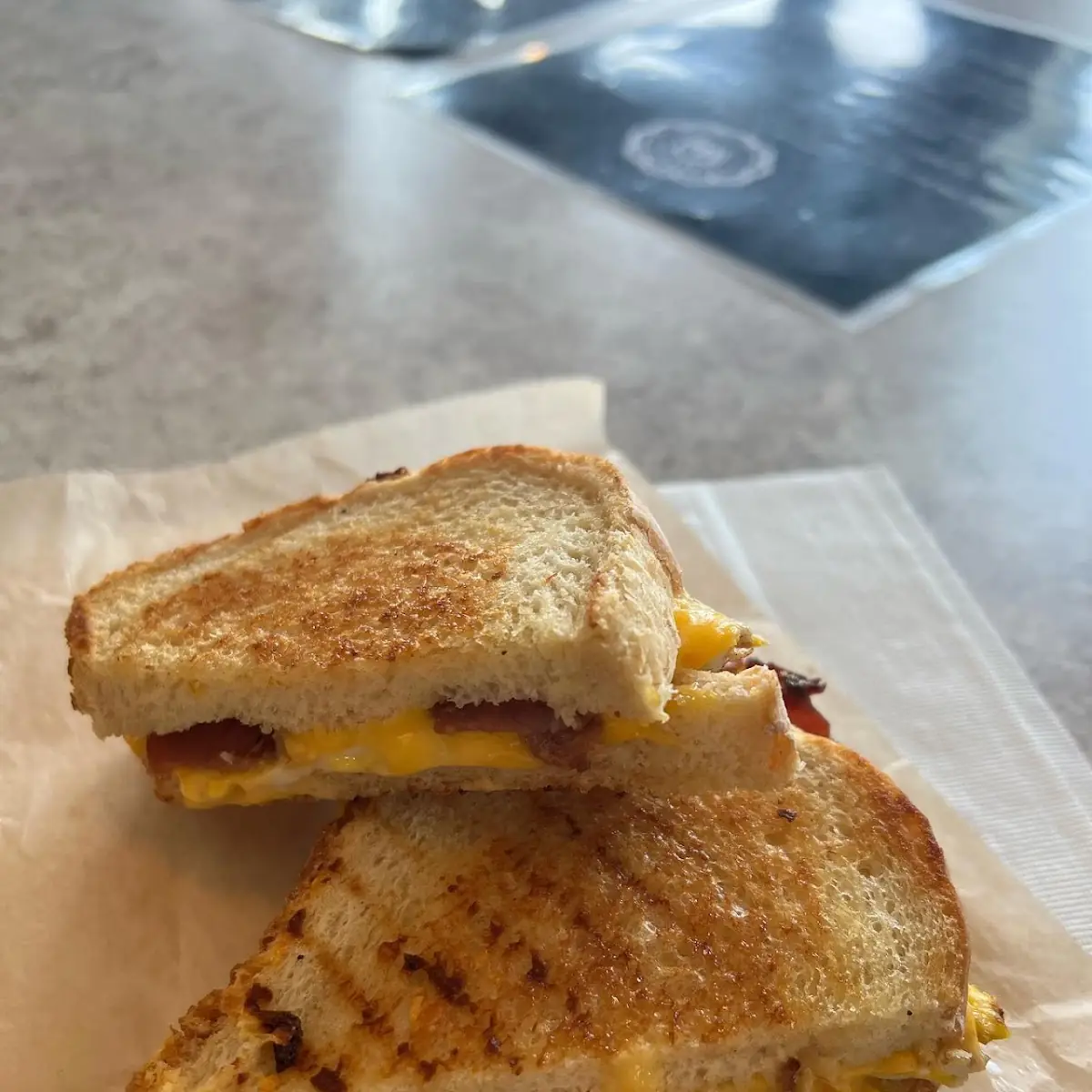 Egg & Cheese Panini with Candied Bacon Sausage or Ham Monte