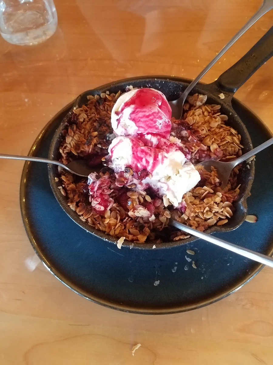 Apple Crumble a La Mode with Huckleberry Sauce