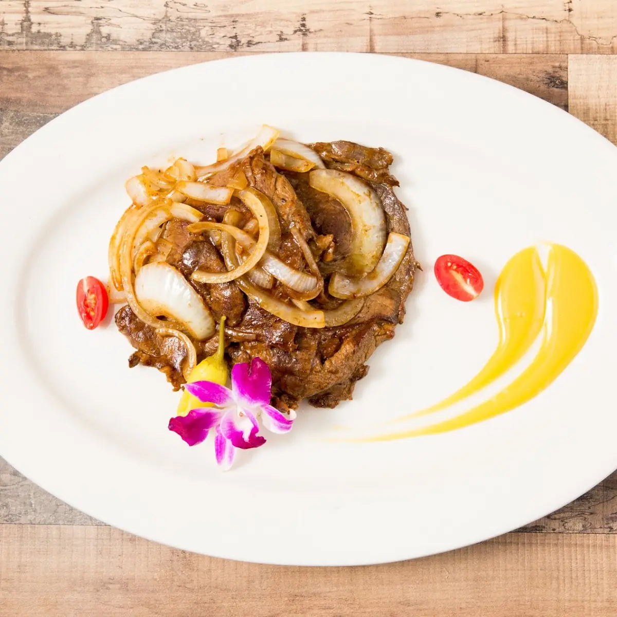 Bistec Encebollado