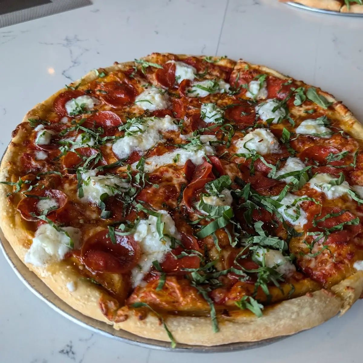 Pepperoni Pizza with Fresh Basil