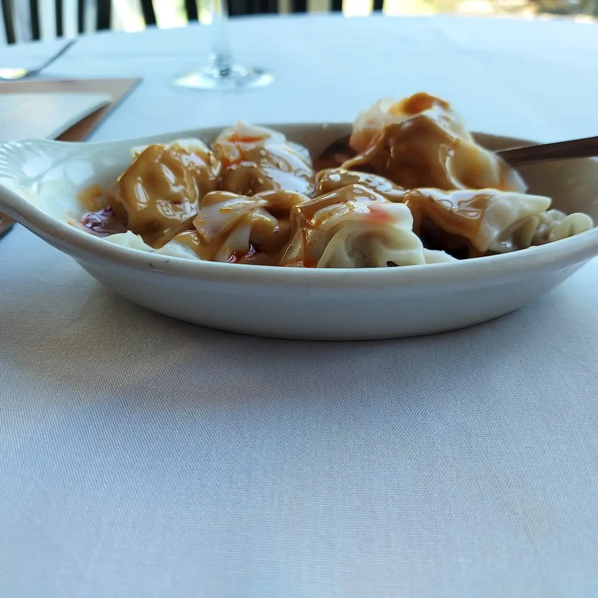 Spicy Dumplings with Peanut Sauce