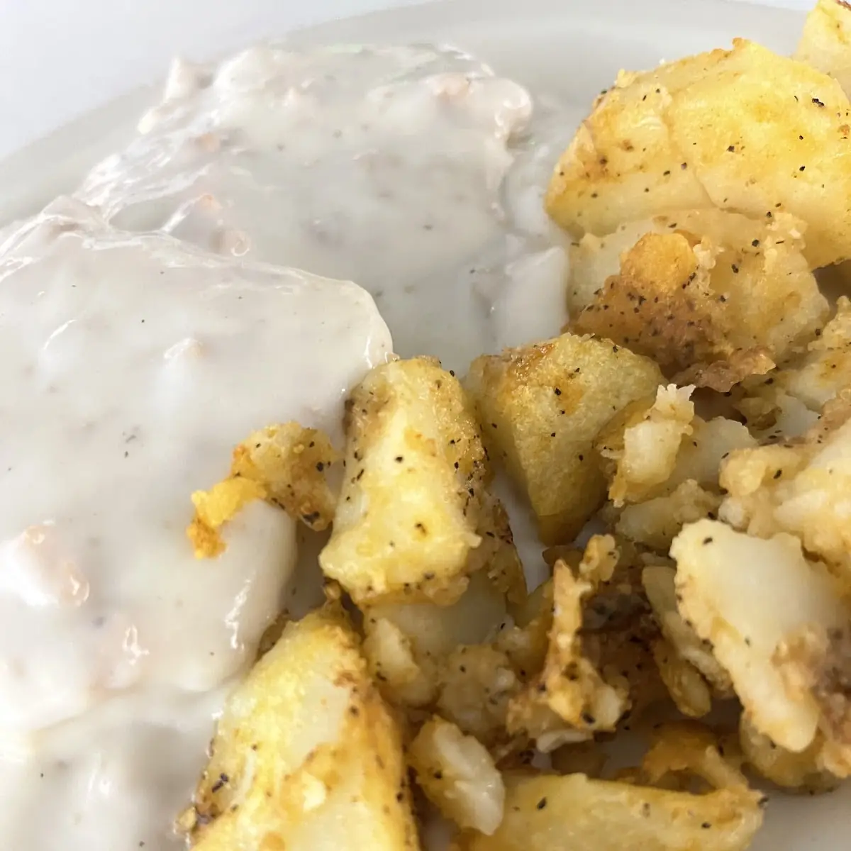 Sausage Gravy over Biscuits and Hash Browns