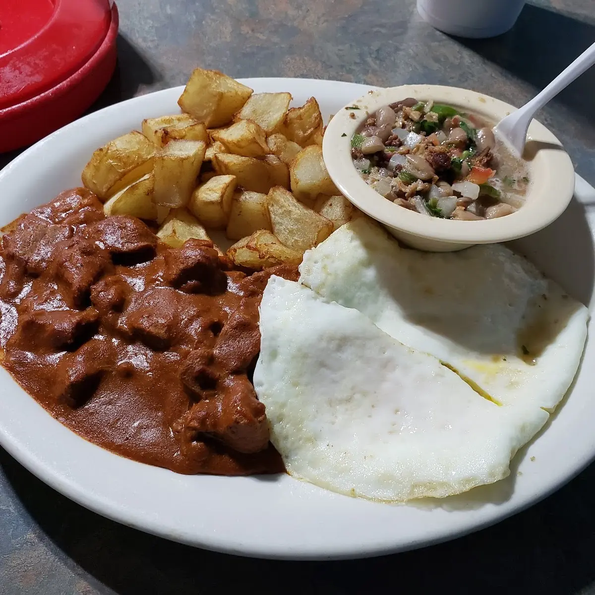 Carne Guisada and Eggs