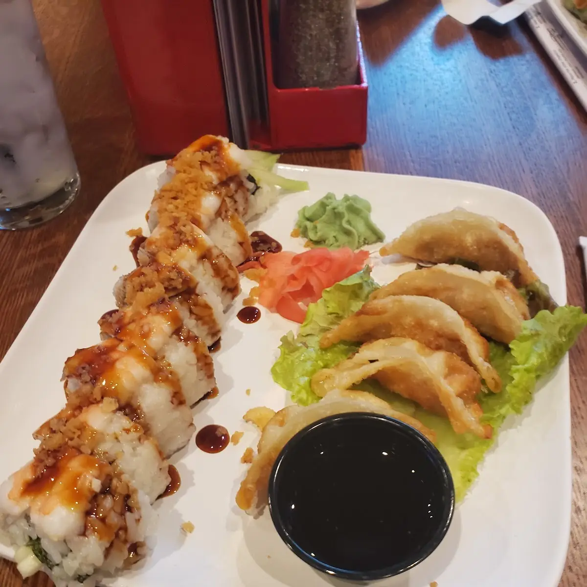 Left Is Fried Crab Rangoon Roll Right Is Calamari Roll