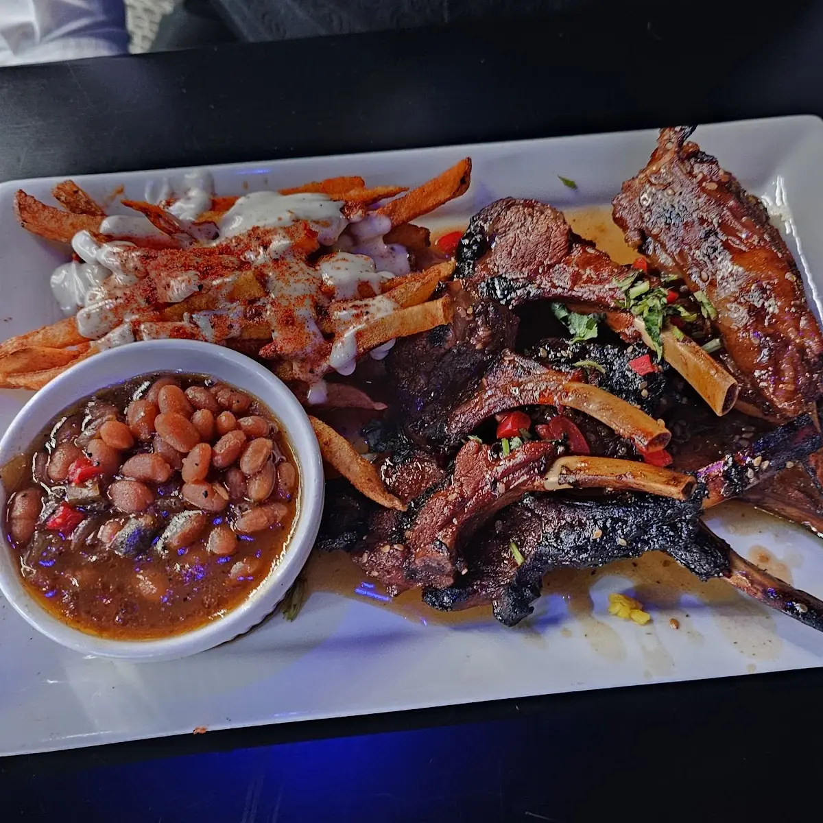 4pc Glazed Lamb Chops 12pc Shrimp 1pc 8oz Grilled Salmon Fillet & Rib Eye Steak