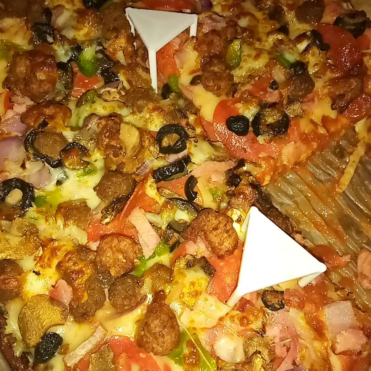 Deep Dish Supreme Pizza from Howie's Pizza