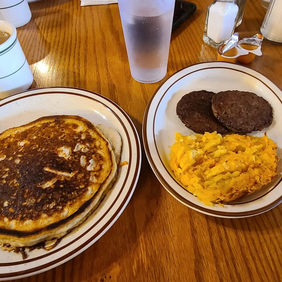 Two Pancakes Bacon or Sausage and a Small Drink