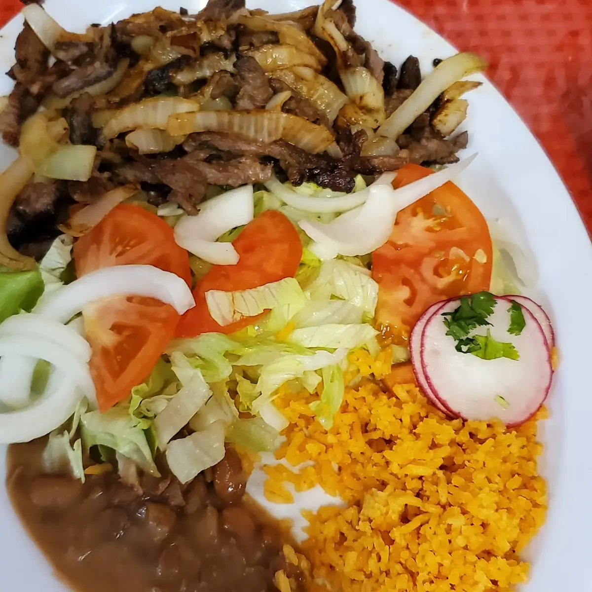 Bistec Encebollado