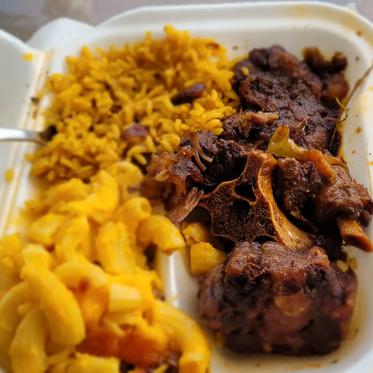 Oxtails Rice & Peas and Mac & Cheese