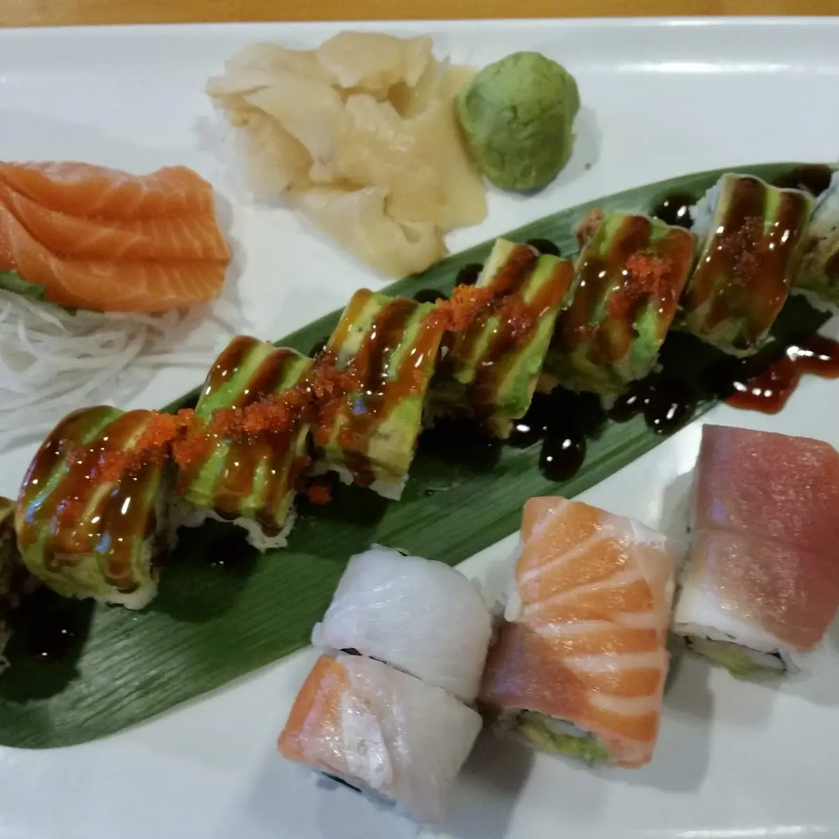 Dragon Roll Rainbow Roll and Salmon Sashimi