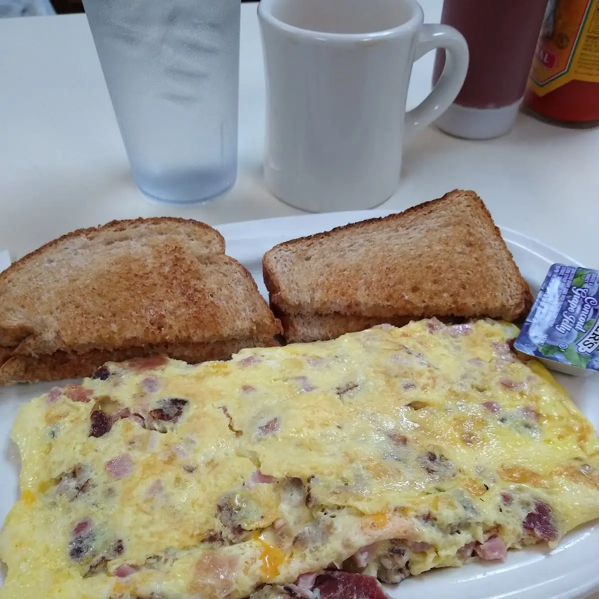 Ham Bacon Sausage and Cheese Omelette