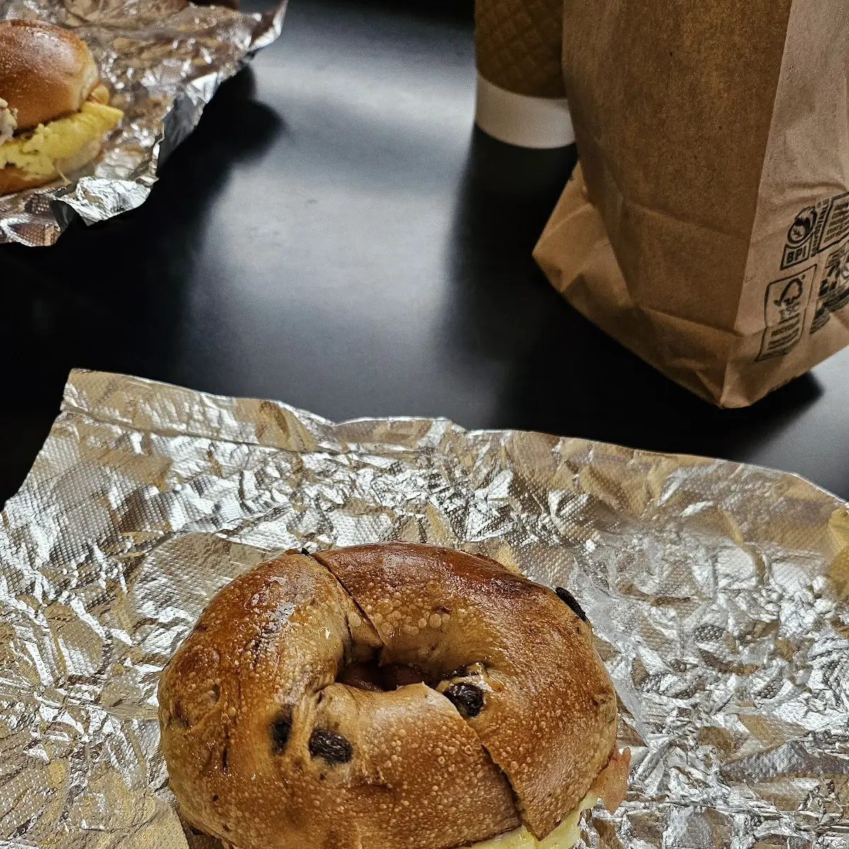 Maple Bacon Egg and Cheese on a Cinnamon Raisin Bagel